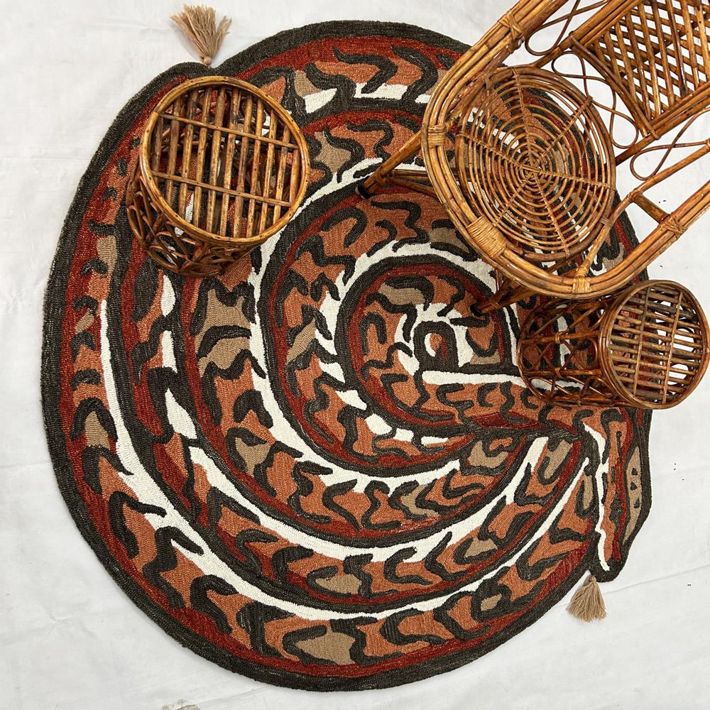 Handmade Oval Snake Pattern Tufted Rug in Rust Orange Black Beige and Cream with Decorative Tassels