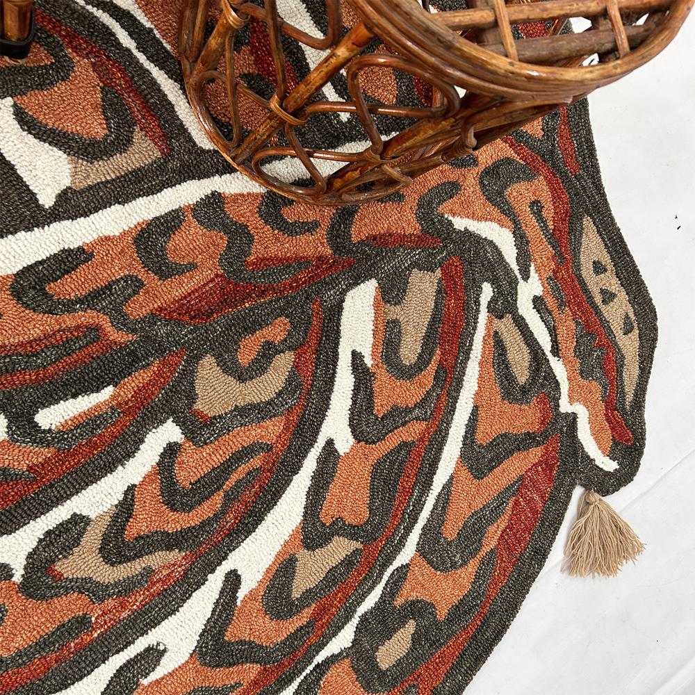 Handmade Oval Snake Pattern Tufted Rug in Rust Orange Black Beige and Cream with Decorative Tassels