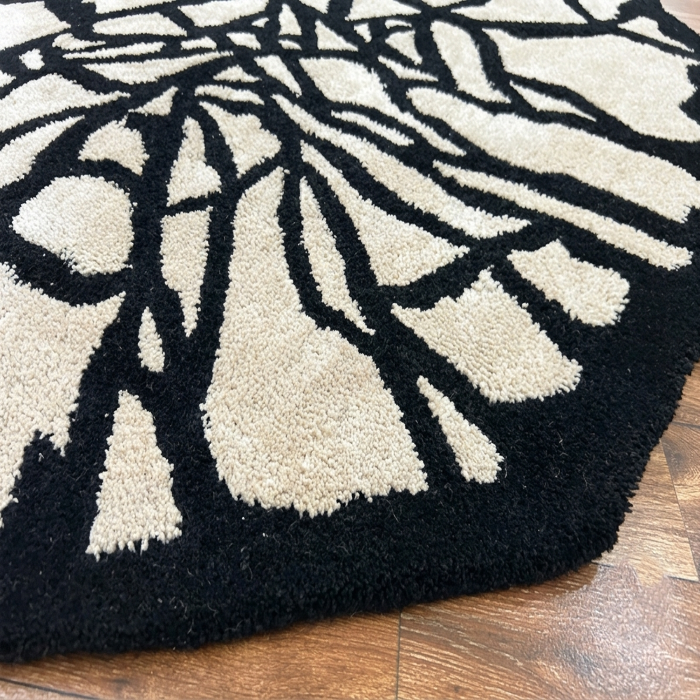 Handmade Black and Cream Abstract Geometric Round Tufted Rug for Modern Home Decor