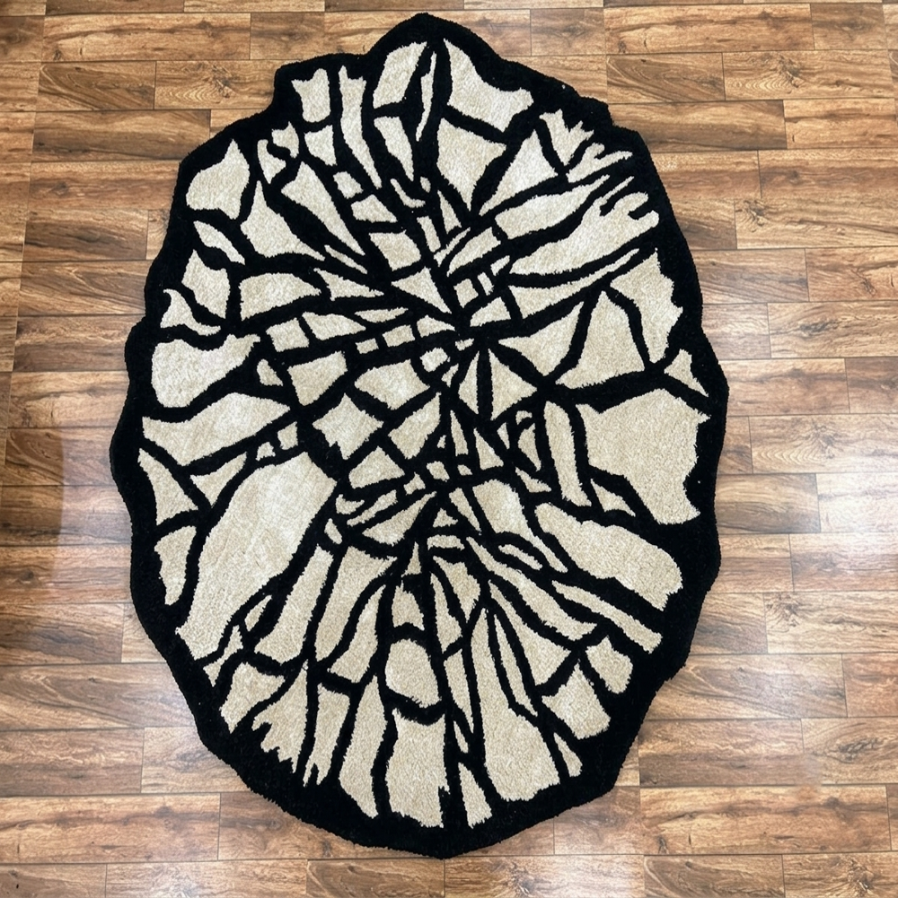 Handmade Black and Cream Abstract Geometric Round Tufted Rug for Modern Home Decor