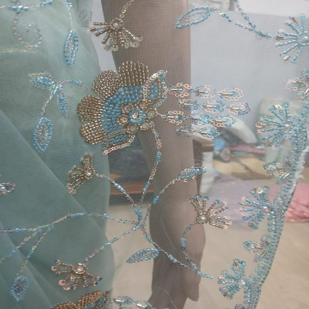 Elegant Sky Blue Embroidered Net Saree with Shimmering Floral Work