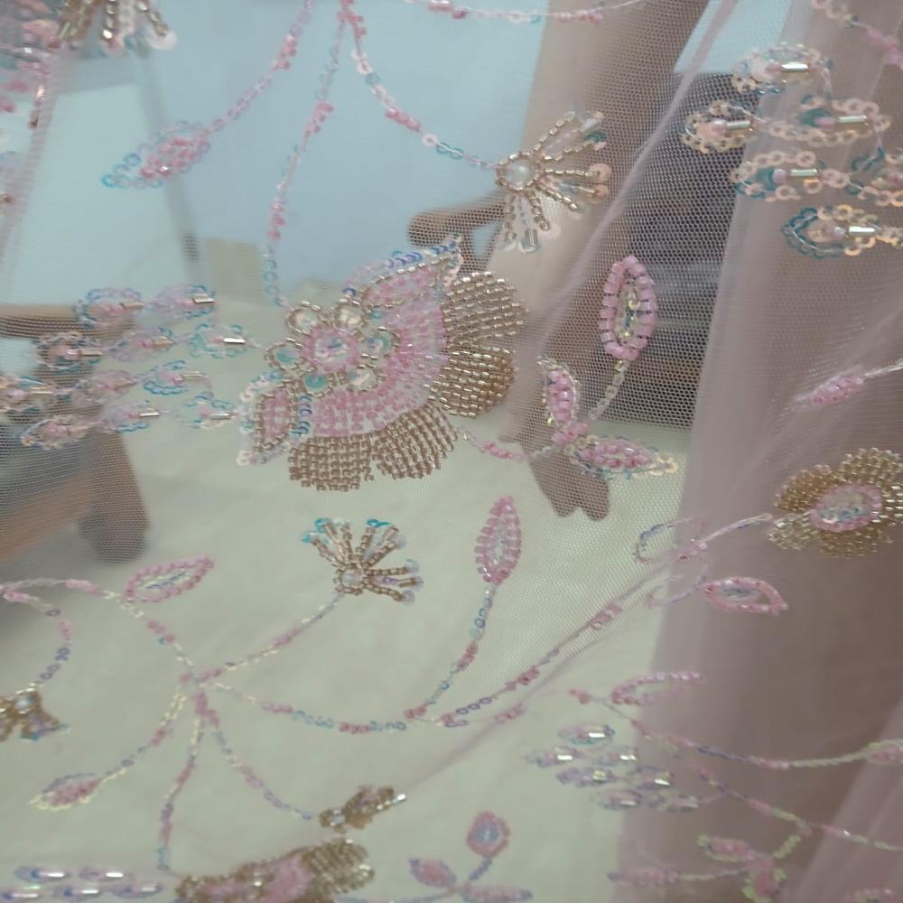 Elegant Blush Pink Embroidered Net Saree with Shimmering Floral Work