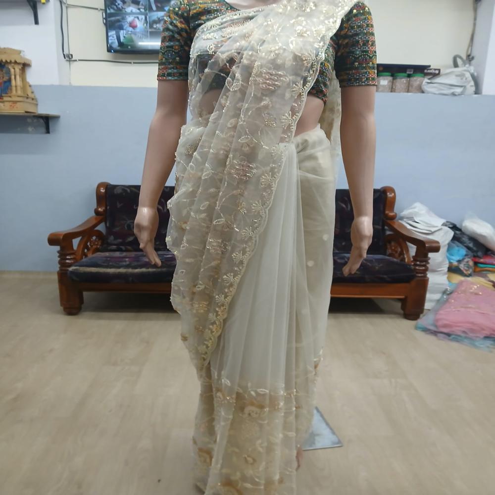 Elegant Ivory Cream Embroidered Net Saree with Golden Floral Work