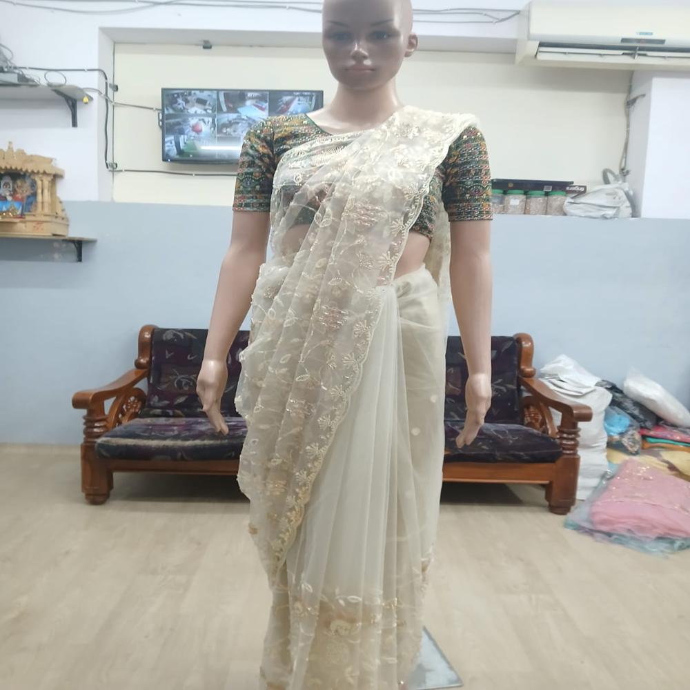 Elegant Ivory Cream Embroidered Net Saree with Golden Floral Work