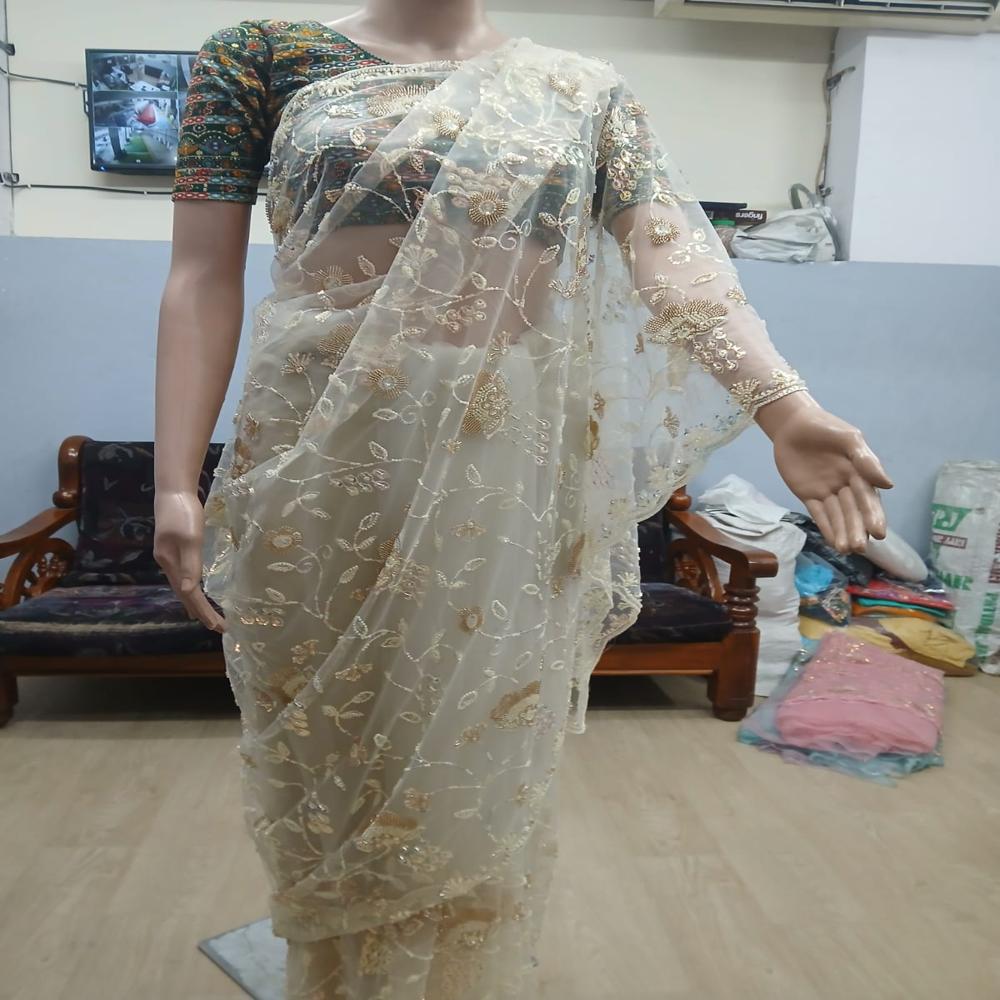 Elegant Ivory Cream Embroidered Net Saree with Golden Floral Work