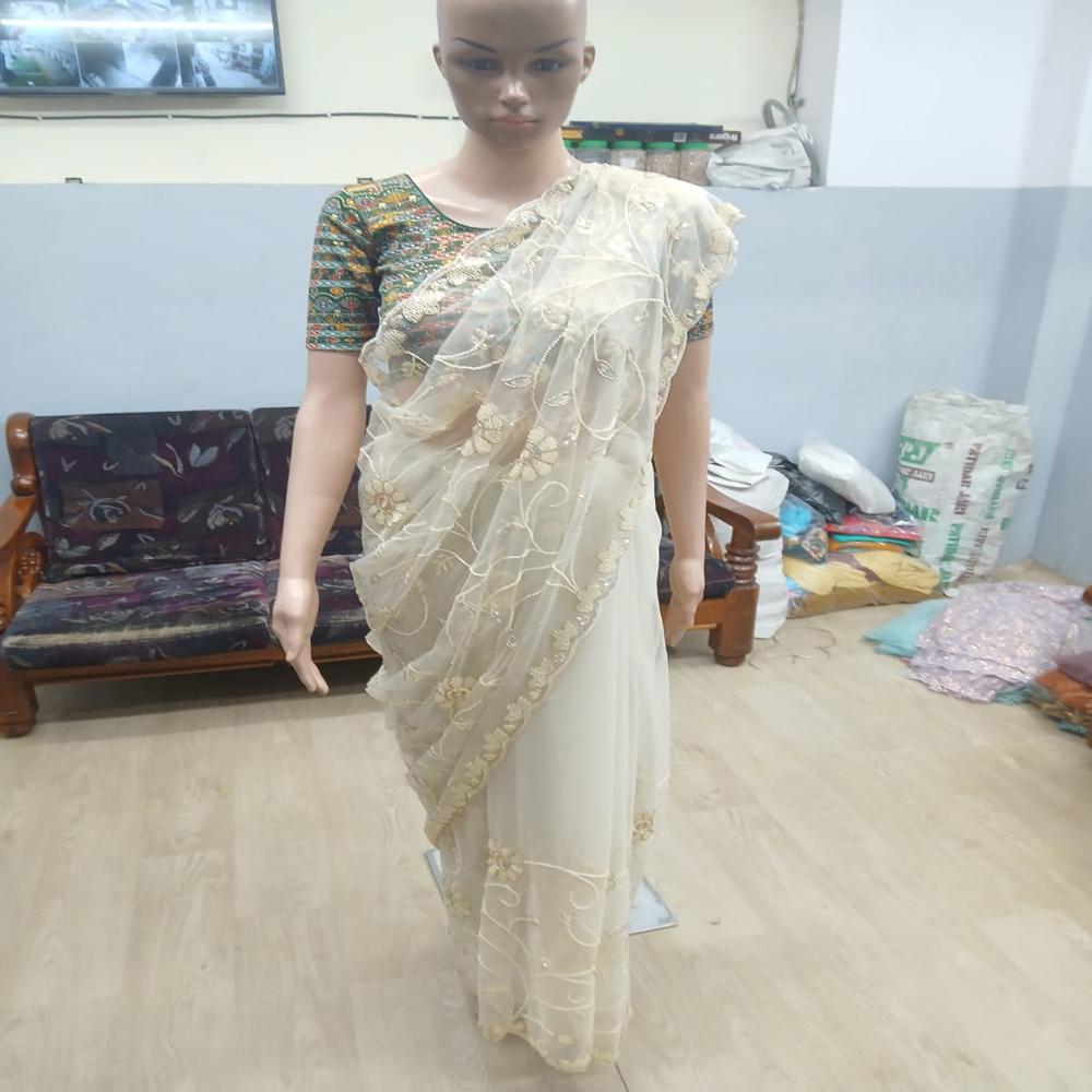 Elegant Ivory Cream Embroidered Net Saree with Floral Sequin Work