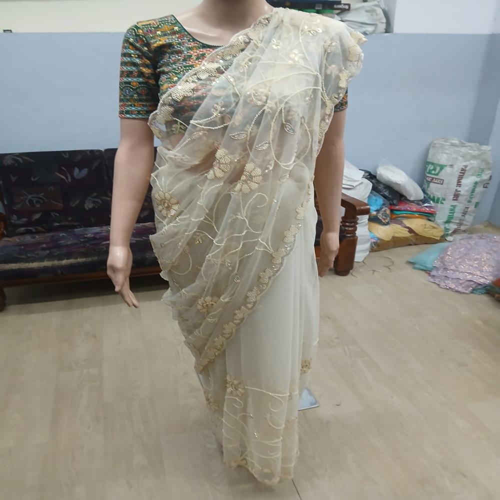 Elegant Ivory Cream Embroidered Net Saree with Floral Sequin Work