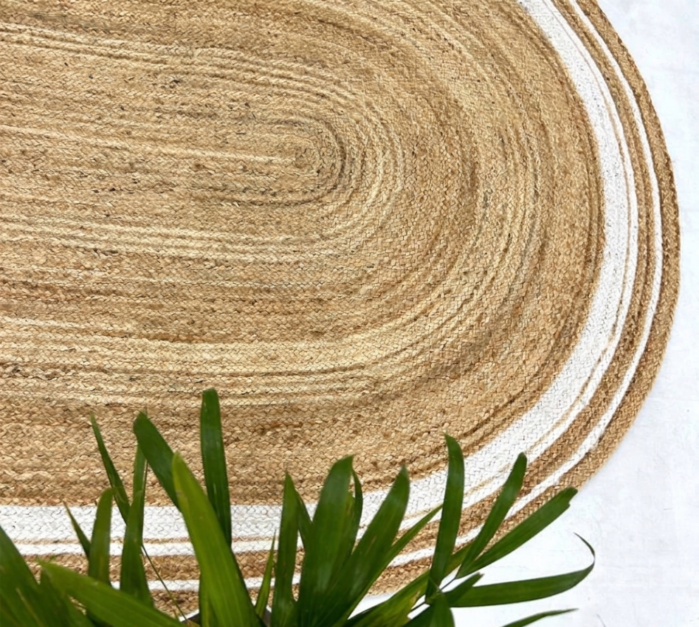 Handcrafted Oval Braided Jute Rug with White Border Accents