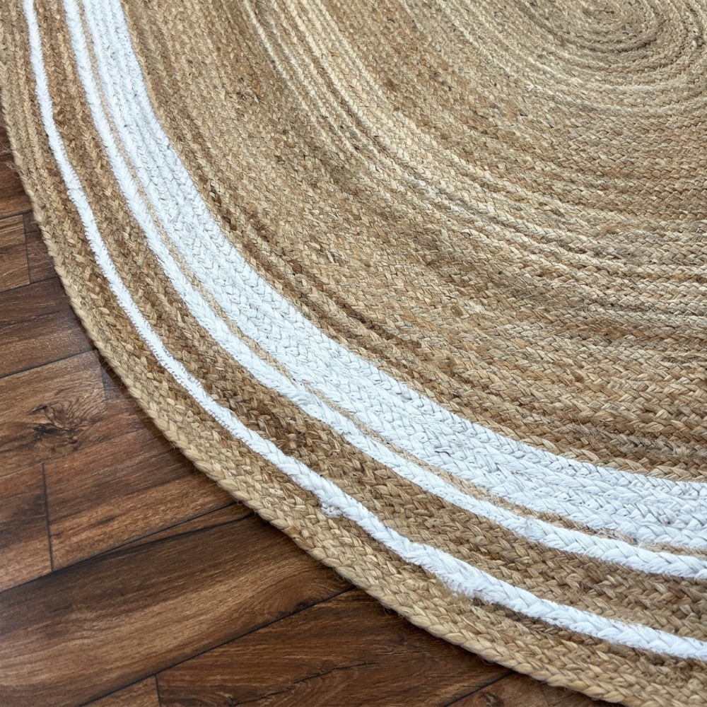 Handcrafted Oval Braided Jute Rug with White Border Accents