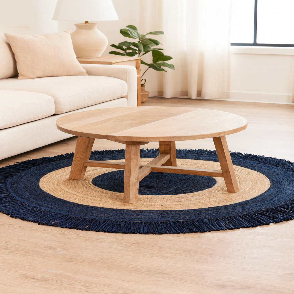 andcrafted Round Jute Rug with Dark Navy Blue Fringe Border