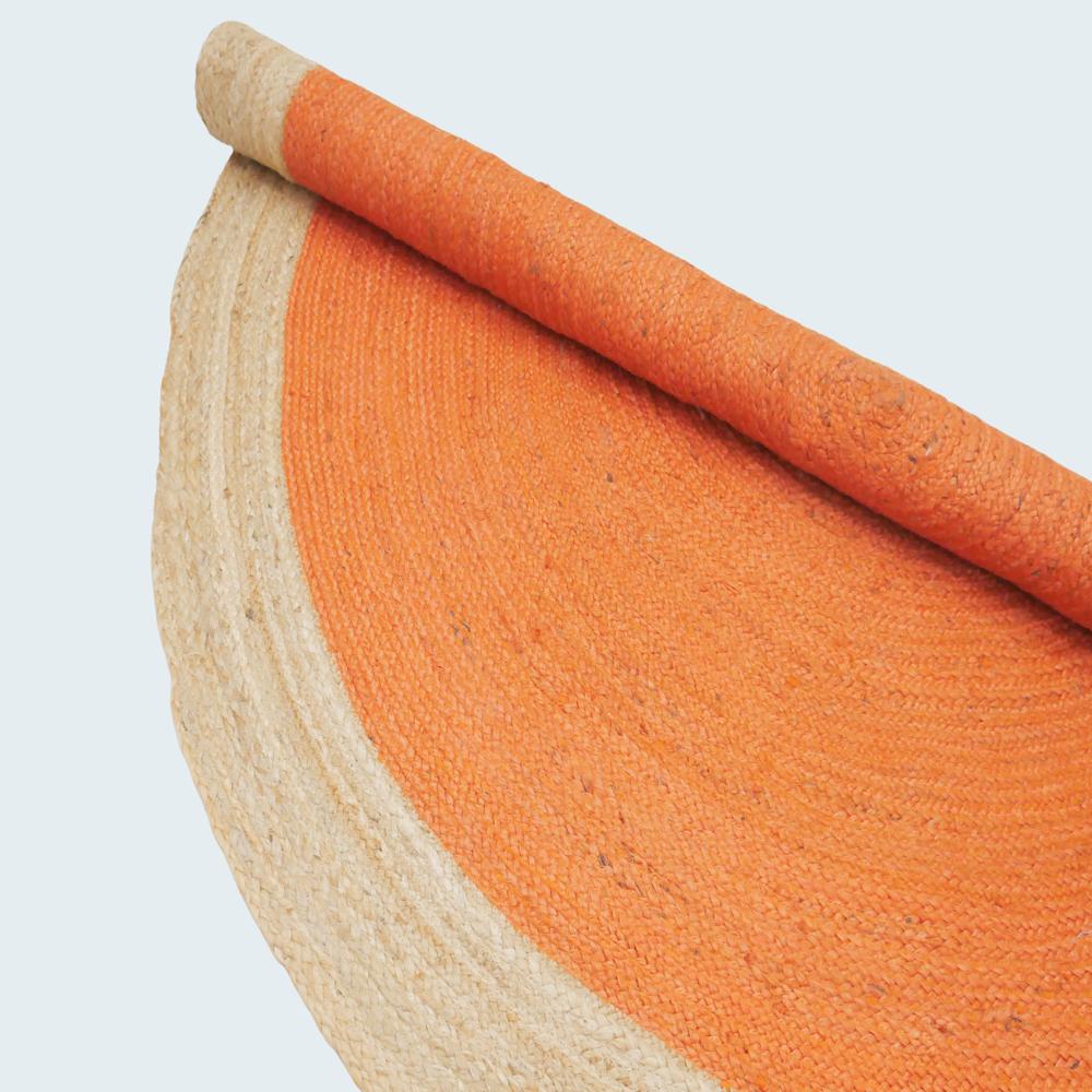 Handcrafted Round Braided Jute Rug with Vibrant Orange Center