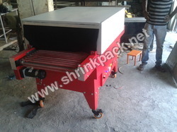 Economy Shrink Tunnel ST-321810 - 18(W) X 8(H) X 32(L) Chamber Size, 220V 1Phase Power Supply, Adjustable Temperature Control, Variable Speed Conveyor, Enhanced Efficiency With Less Power Consumption