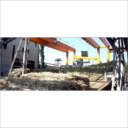 क्रेन और गन्ना अनलोडर का केंद्रीकरण