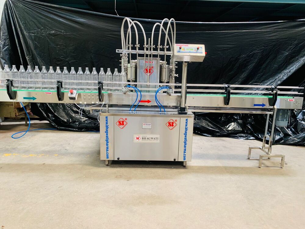 Volummetric Six Head Liquid Filling Machine - Automatic Grade: Automatic