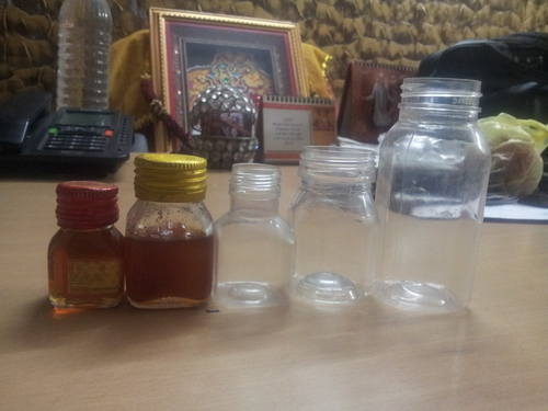 Pet Honey Bottles - Transparent PET Plastic, Round Shape with Screw Cap | Lightweight, High Shock Resistance, Customizable Designs