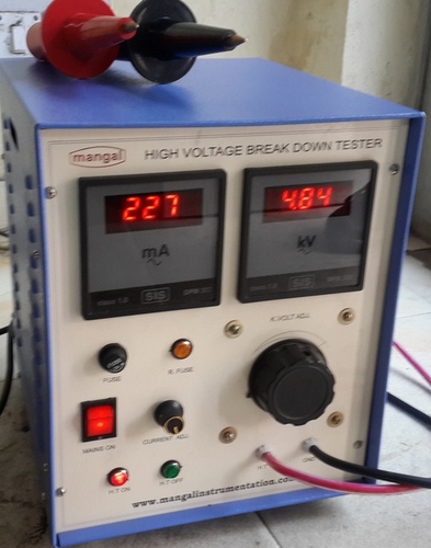 Cream And Blue High Voltage Tester