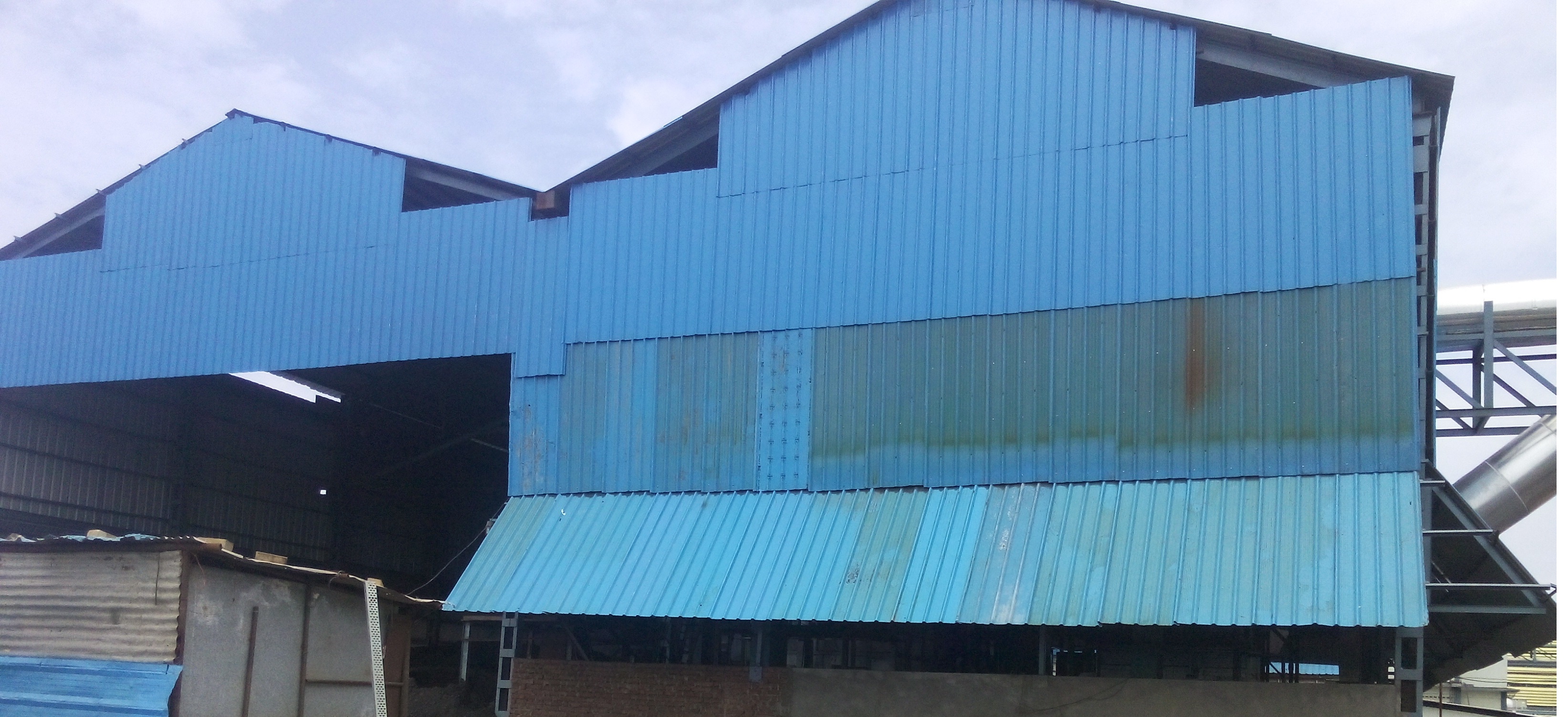 Industrial Building Construction Services - Rcc Structure, Tri-mix Flooring, Pre-coated Sheet Roofing, Various Sheds, Alterations