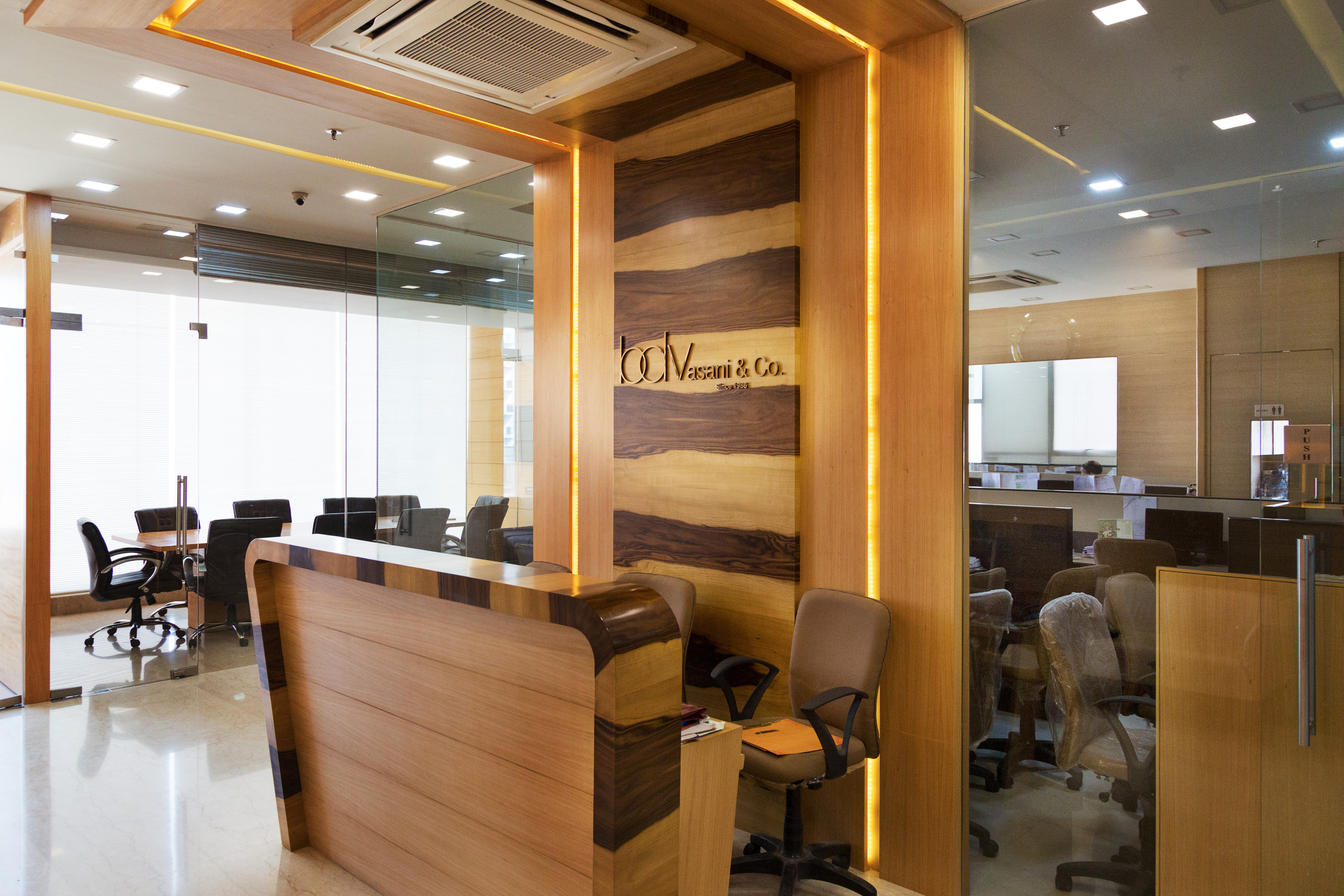 Corporate Office Interior - Glass And Wood Design, Rectangular Layout, Brown Color, Seating Capacity 8-12 | Collaboration Hub, Enhanced Productivity, Modern Design