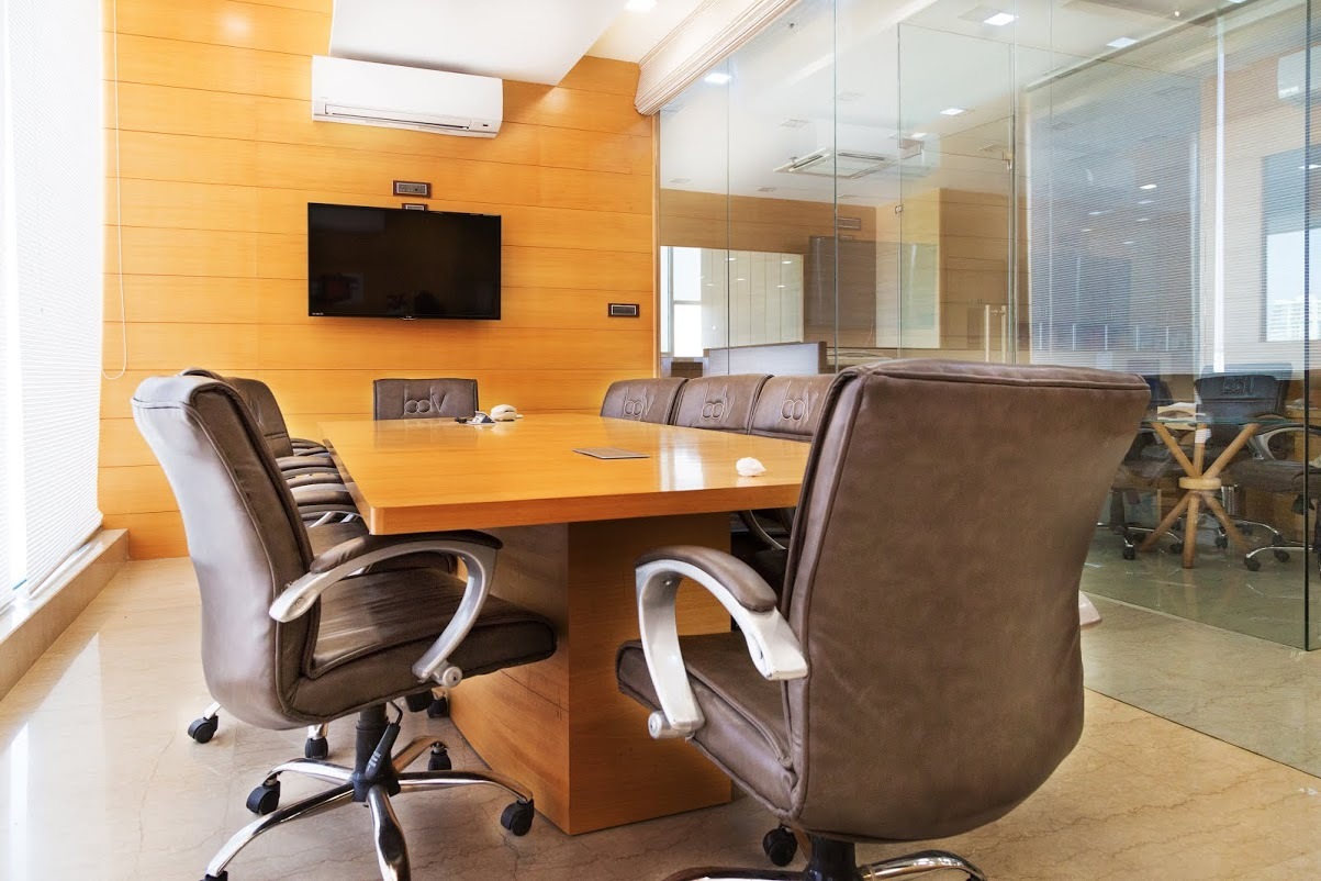 Corporate Office Interior - Glass And Wood Design, Rectangular Layout, Brown Color, Seating Capacity 8-12 | Collaboration Hub, Enhanced Productivity, Modern Design