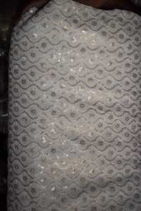 कढ़ाई के कपड़े आपूर्तिकर्ता