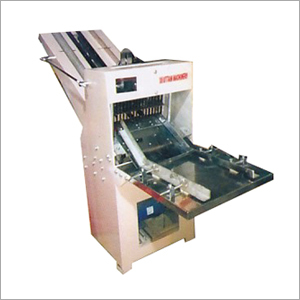 ग्रे और सिल्वर ब्रेड स्लाइसर