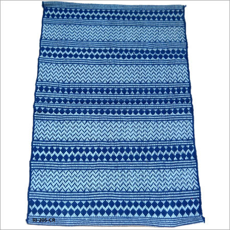 हाथ से बनाई गई दरी