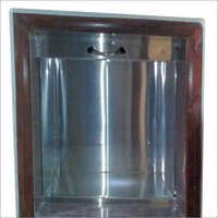 डंब वेटर बाय पार्टिकल डोर