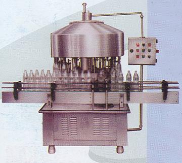 SEMI AUTOMATIC ROTARY GRAVITY FILLER WITH AUTO LOADING & UNLOADING