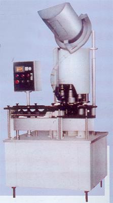 AUTOMATIC SCREW CAPPER WITH CONVEYOR
