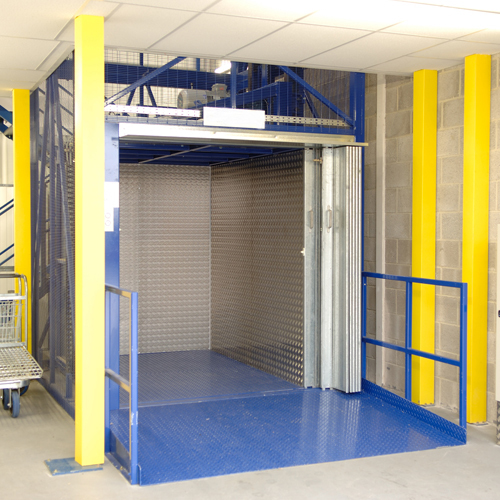 Hydraulic Goods Lift - Up To 5 Ton Capacity, 23 M Height, Customizable Enclosure | Smooth Belt Movement, Enhanced Safety Valves, Minimal Maintenance Costs, Quick Service Accessibility