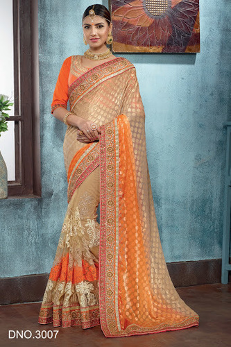 क्रीम ब्रासो नेट डिजाइनर साड़ी