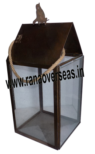 Brown Iron Metal Lantern With Bird Sitting On It 10418