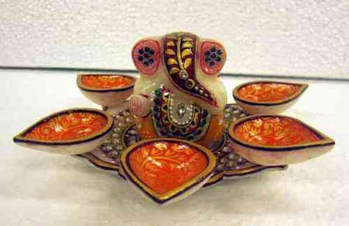 Orange Ganesh Statue With Diya