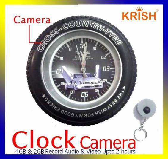 Wall Mounted Racing Tire Analog Clock - Stainless Steel, Silver Color, 12 Hour Display | Hidden Spy Camera, Motion Activated, Remote Control, 640x480 Video Recording, Rechargeable Battery, 32gb Memory Support