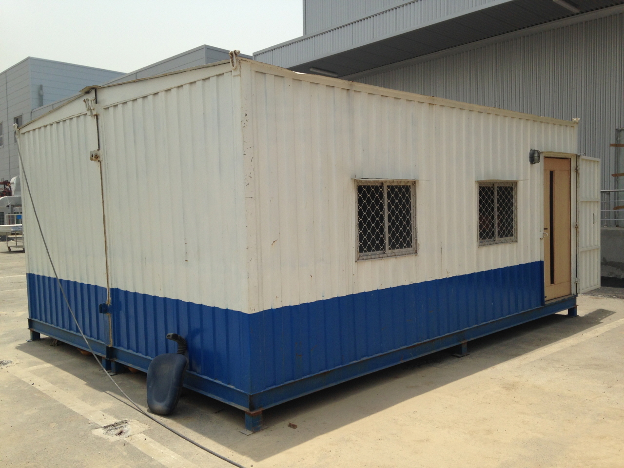 Portable Office Containers - Metal Sheet Roof, Container Walls, White & Tata Blue Colors | Two Aluminum Windows, Dual Doors