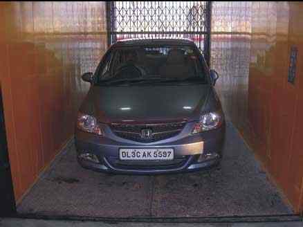 Automobile Elevators - Iron Material, Load Capacity 5000 Kg | Vvvf Drive Type, Freight Elevator With Over Speed Protection And Designated Stop