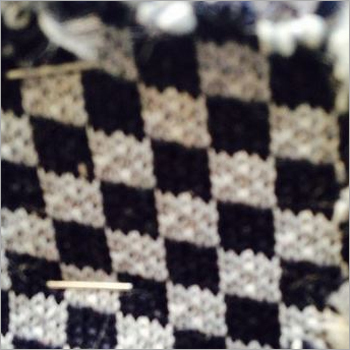 सफेद और काले रंग का होज़री फ़ैब्रिक