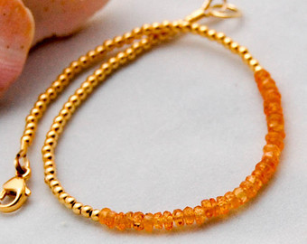 Beads (spessartite) necklaces