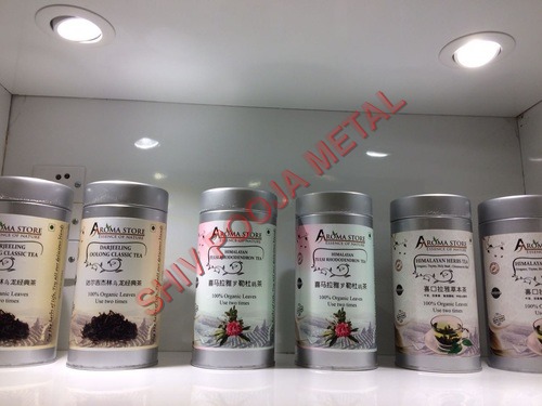 व्हाइट एंड ग्रे चॉकलेट राउंड कैन