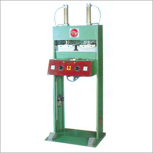 टो पफ अटैचिंग मशीन