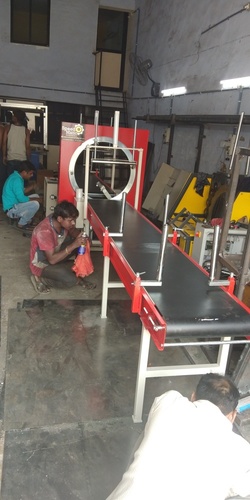 क्षैतिज रिंग लपेटने की मशीन