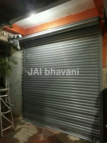 Semi flat motorized rolling shutter