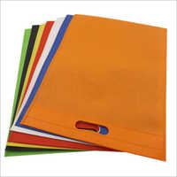 डी कट रंग का गैर बुना बैग