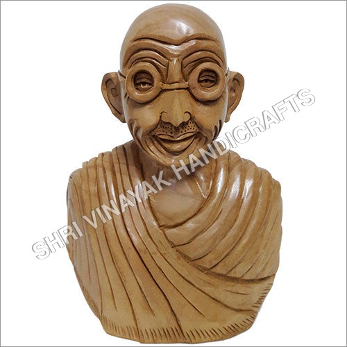 लकड़ी की गांधी जी की मूर्ति