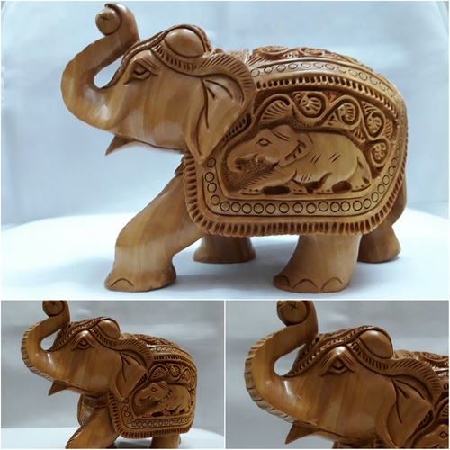 लकड़ी से नक्काशीदार हाथी