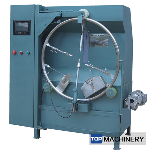 गेंद लपेटने की मशीन