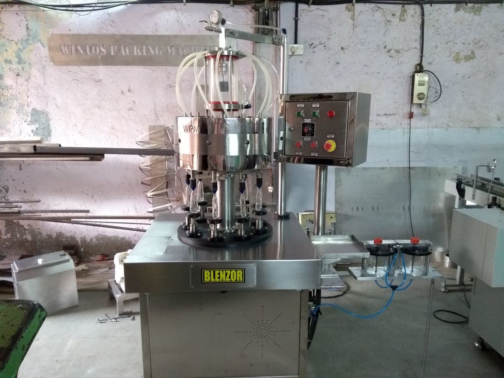 Perfume Filling Machine.
