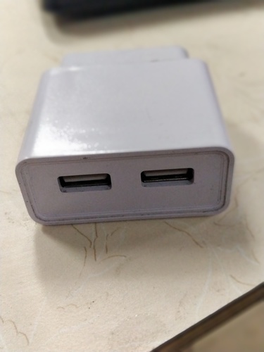 Dual USB Charger - ABS Plastic, 50x50x30 mm, White | Charges Multiple Devices Simultaneously, Compact Design for Travel