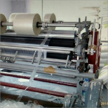 केंद्र पुनः लपेटने वाली मशीन