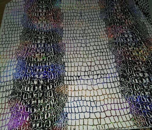 स्नेक प्रिंट लेदर